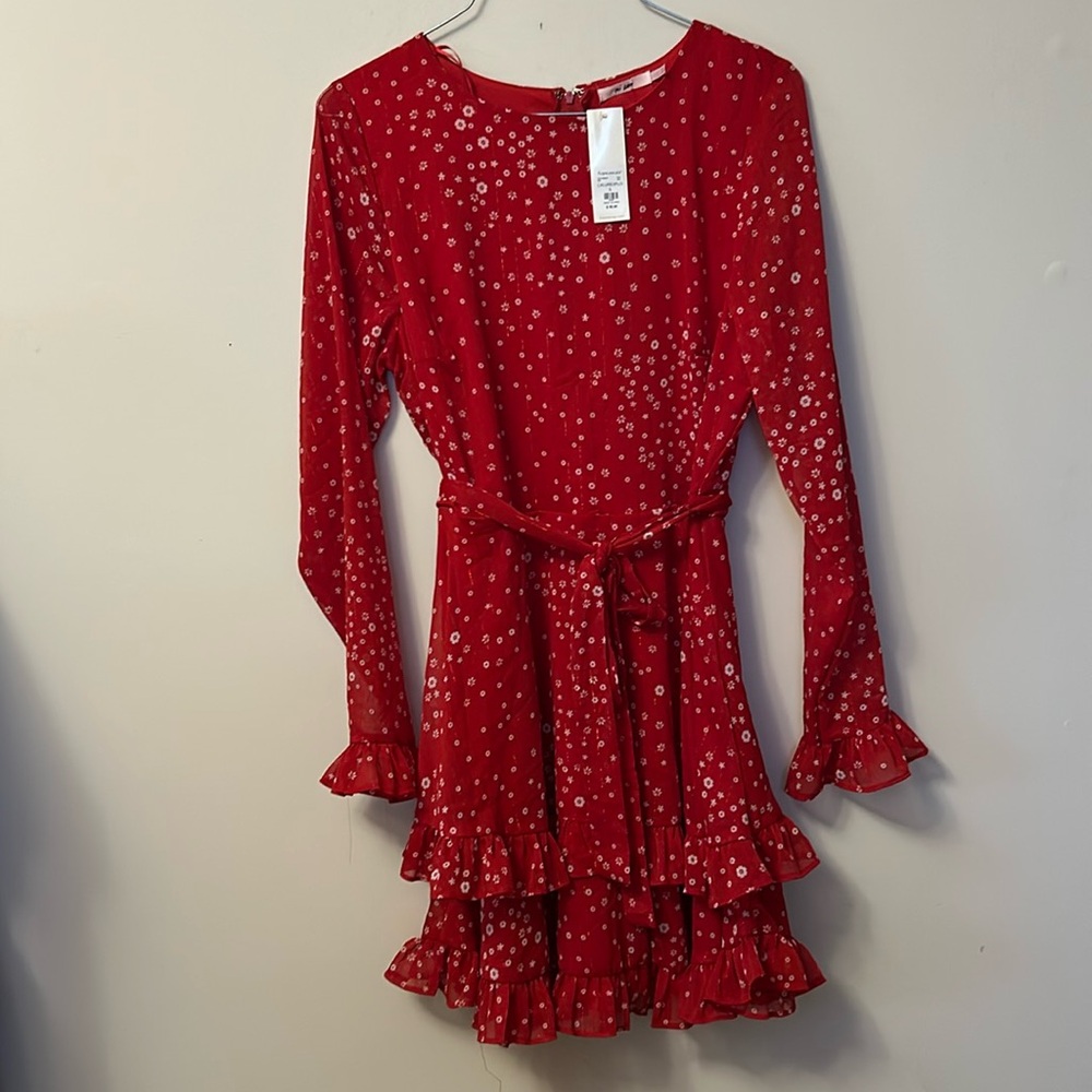 Francesca’s dress with ruffles on bottom & sleeves tie at waist zip back size L